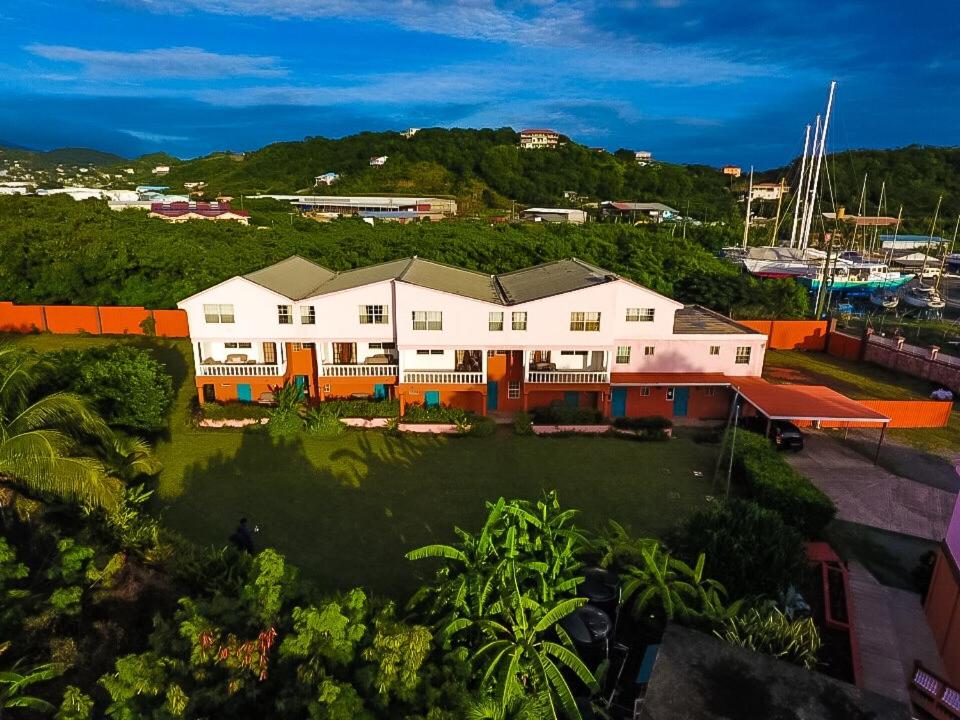 an aerial view of a large house with a yard at Cool Premier Apts. - Airport/SGU in Blow Hole
