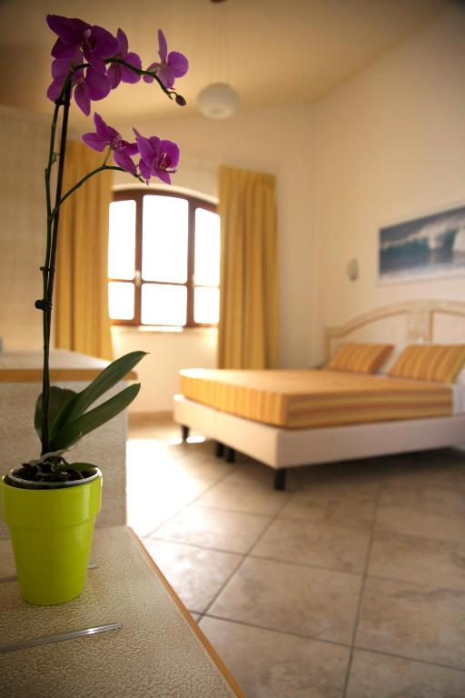Łóżko lub łóżka w pokoju w obiekcie Hotel Raffael PHG