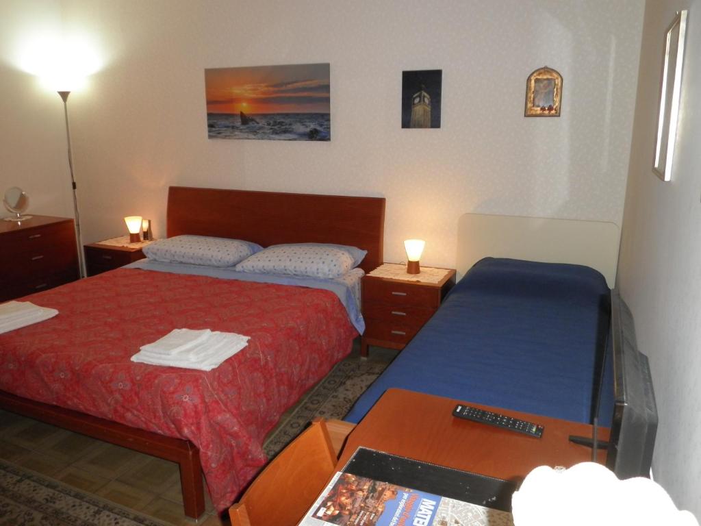 Postel nebo postele na pokoji v ubytování Don Milani