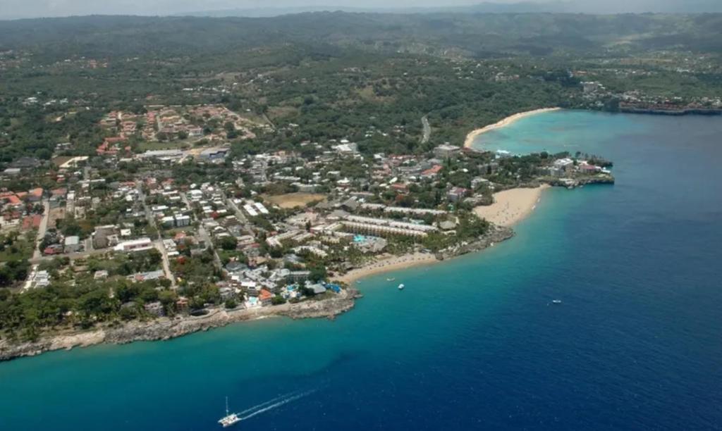 an aerial view of a small island in the water at Hispaniola Residential - Villas & Apartments! in Sosúa