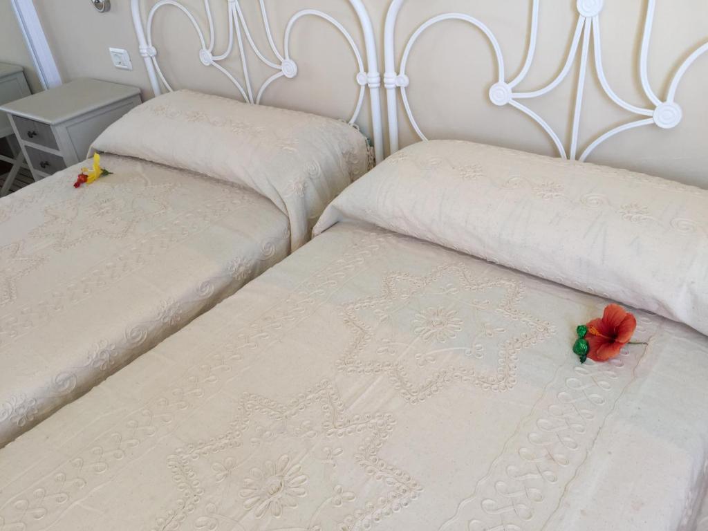 Posteľ alebo postele v izbe v ubytovaní Apartamento Danmi y Janet