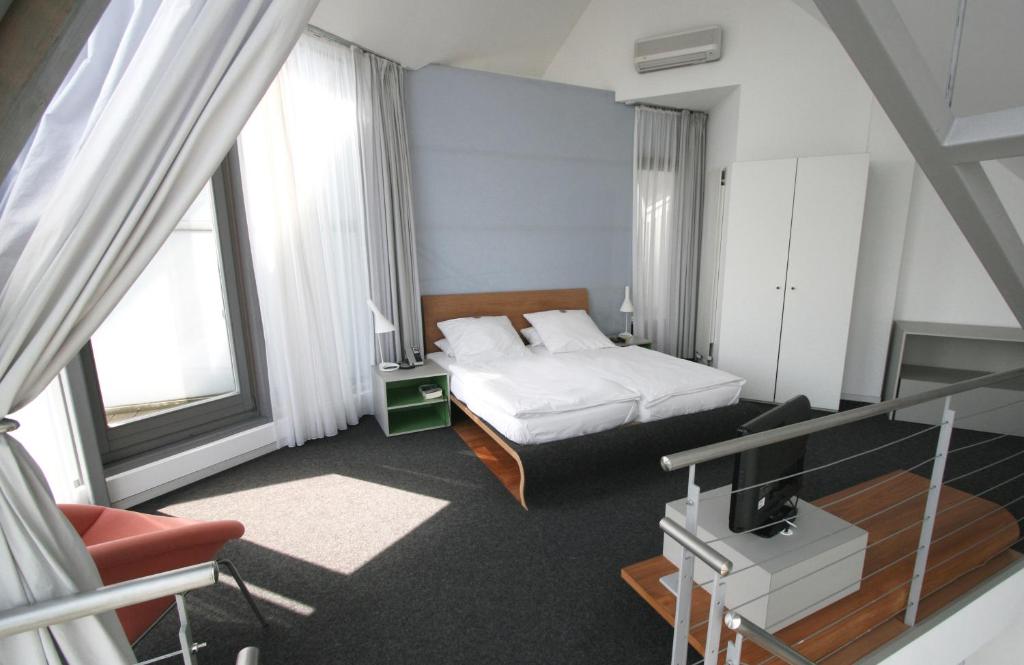 Postel nebo postele na pokoji v ubytování Chelsea Hotel