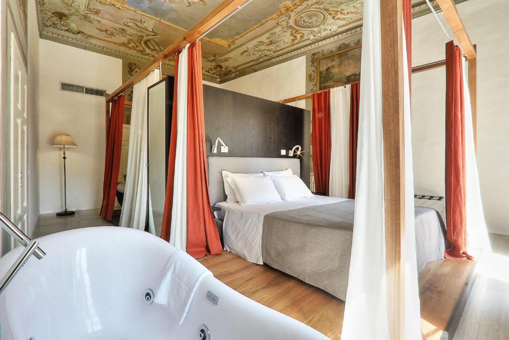 Postel nebo postele na pokoji v ubytování Hotel La Scaletta al Ponte Vecchio