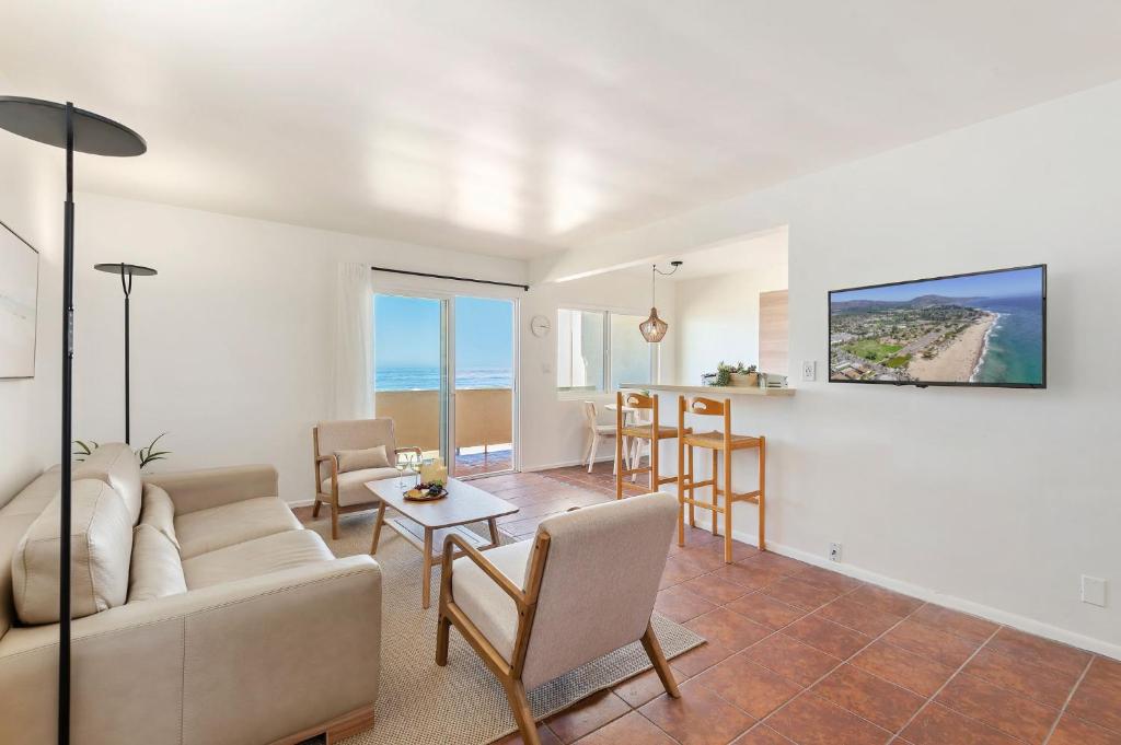 a living room with a couch and a table at Carpinteria Shores CS 210 in Carpinteria