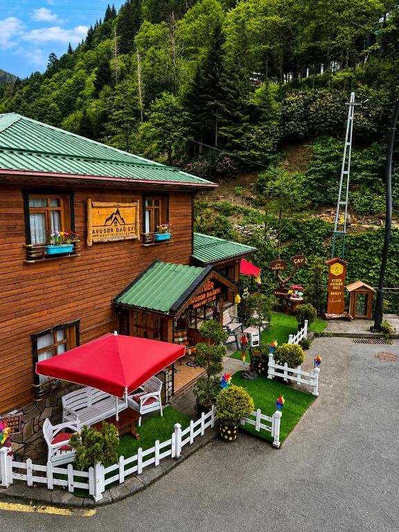 a model of a house with a red roof at Ayder Avusor Hotel in Ayder Yaylasi