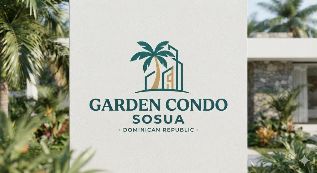 a sign for a garden cordo siesta resort at Garden Condo in Sosúa