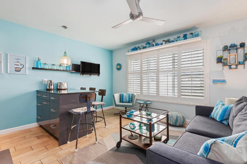 a living room with a couch and a table at Sunset Shores Sunset Shores 246 in Carpinteria