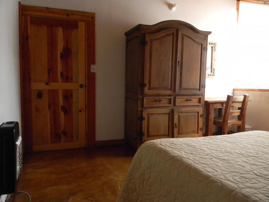 Postel nebo postele na pokoji v ubytování La Troje de Adobe