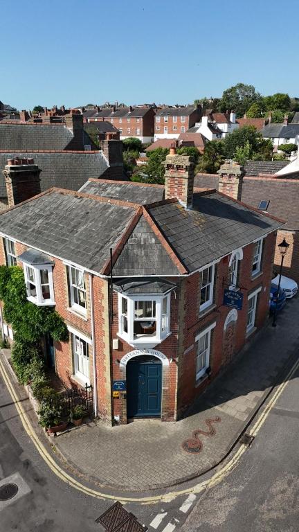 an aerial view of a brick building with a garage at Britannia House in Lymington
