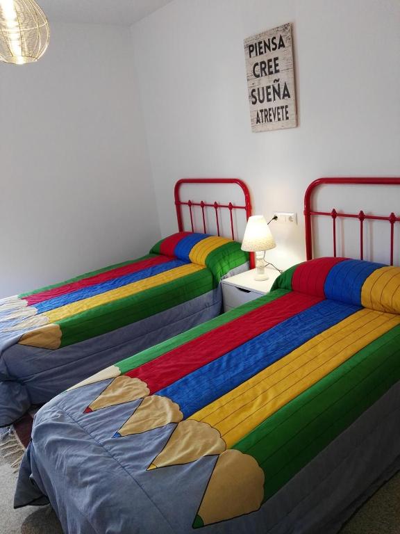 Postel nebo postele na pokoji v ubytování Velez Nazari Cambriles