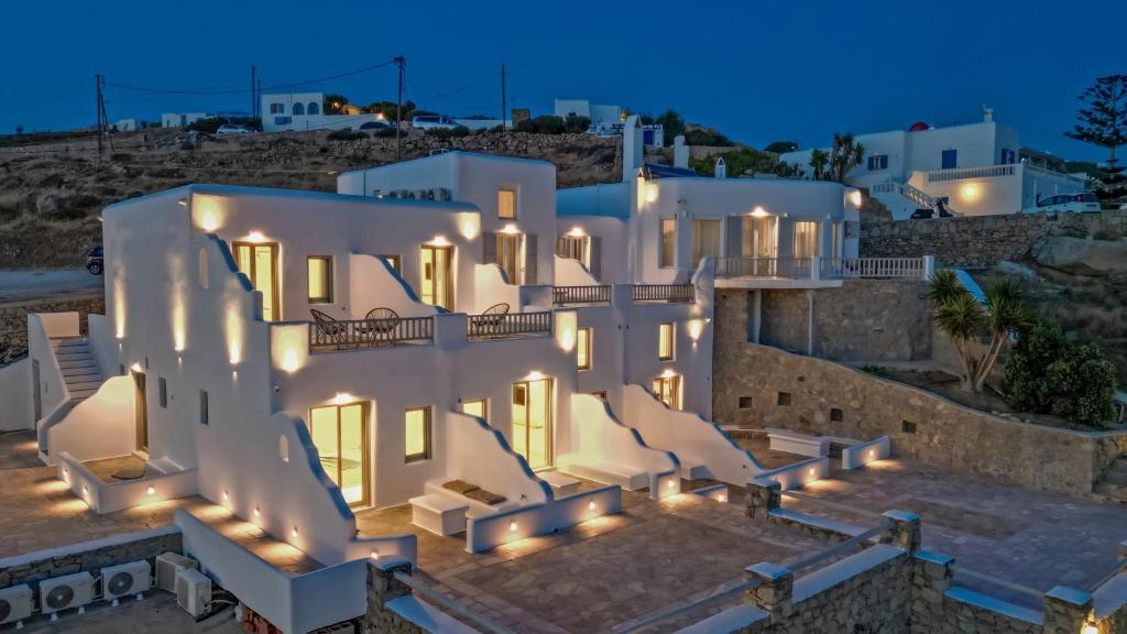 a view of a villa at night at Stilvi Mykonos in Ornos
