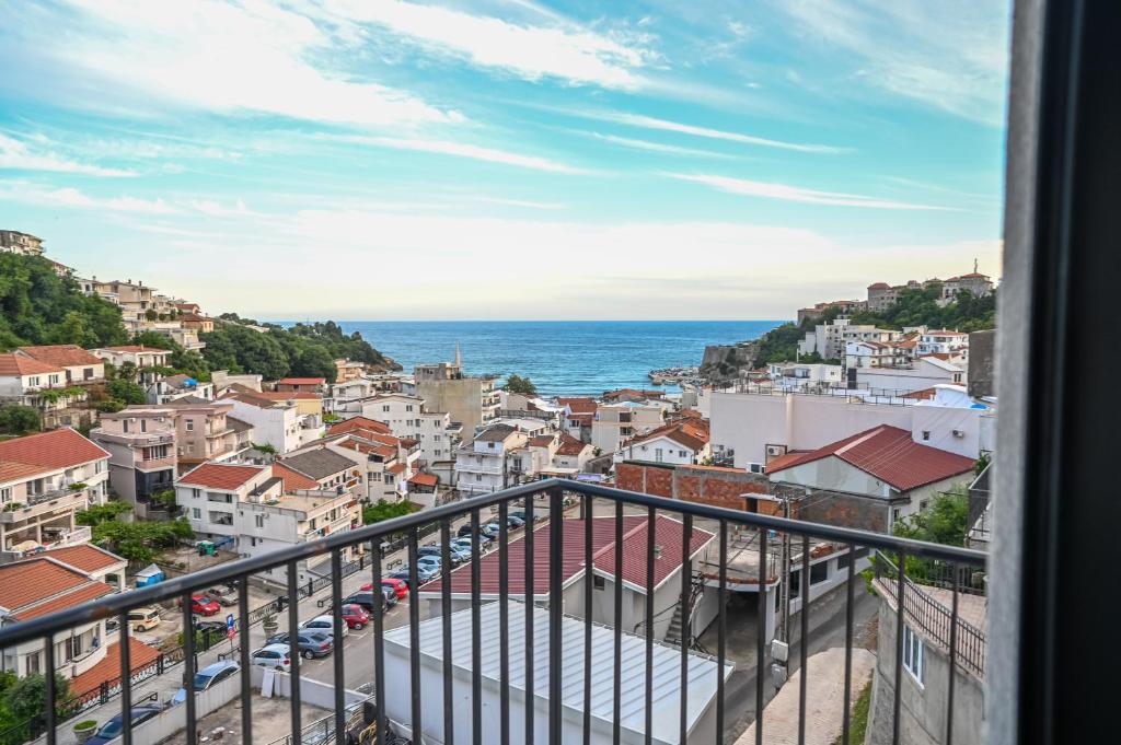 a view of a city from a balcony at Hana boutique apartments in Ulcinj
