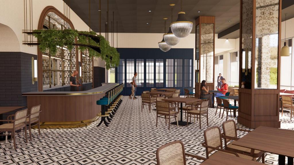a rendering of a restaurant with tables and chairs at Hotel Indigo - Minneapolis Downtown by IHG in Minneapolis