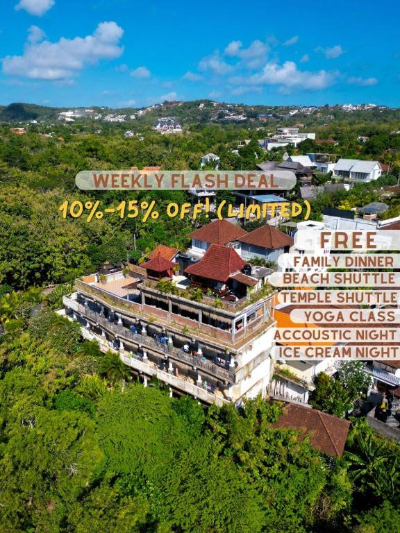 an image of a building with a sign at Karma Backpacker in Uluwatu