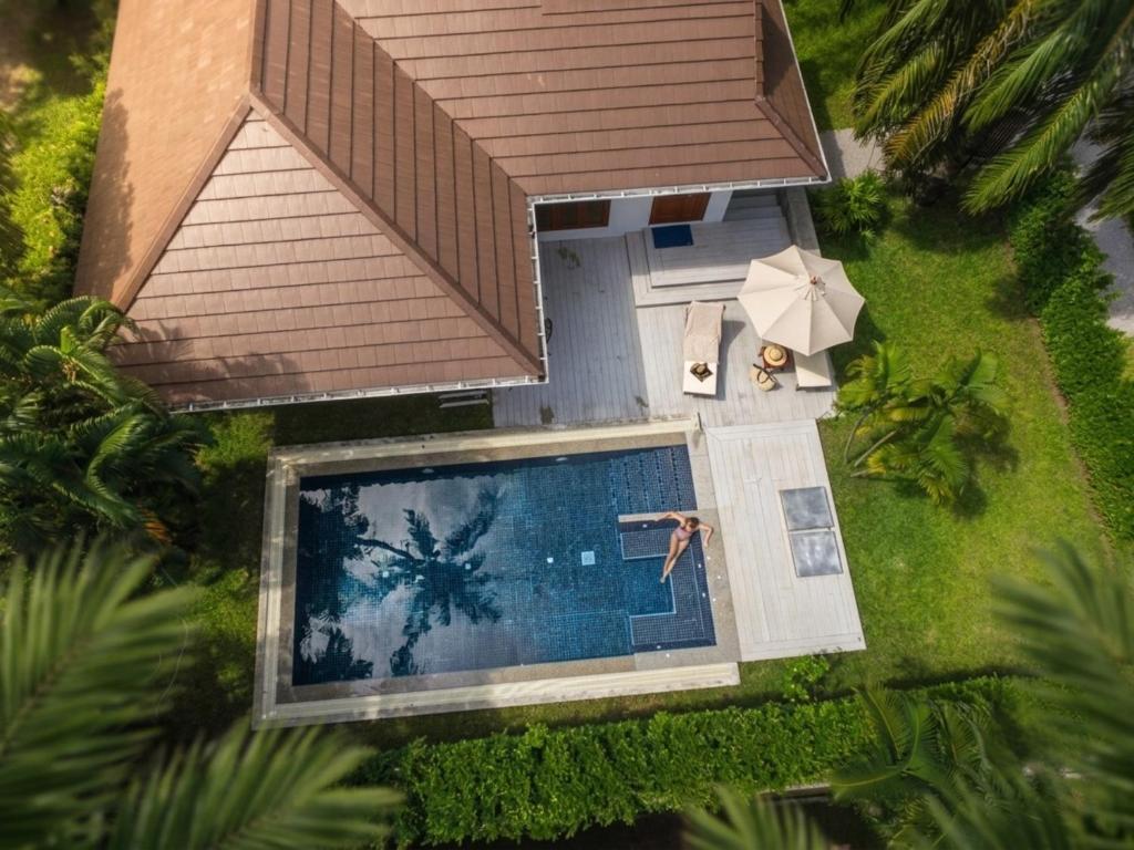 an overhead view of a swimming pool in a resort at Alisea Pool Villa Aonang in Ao Nang Beach