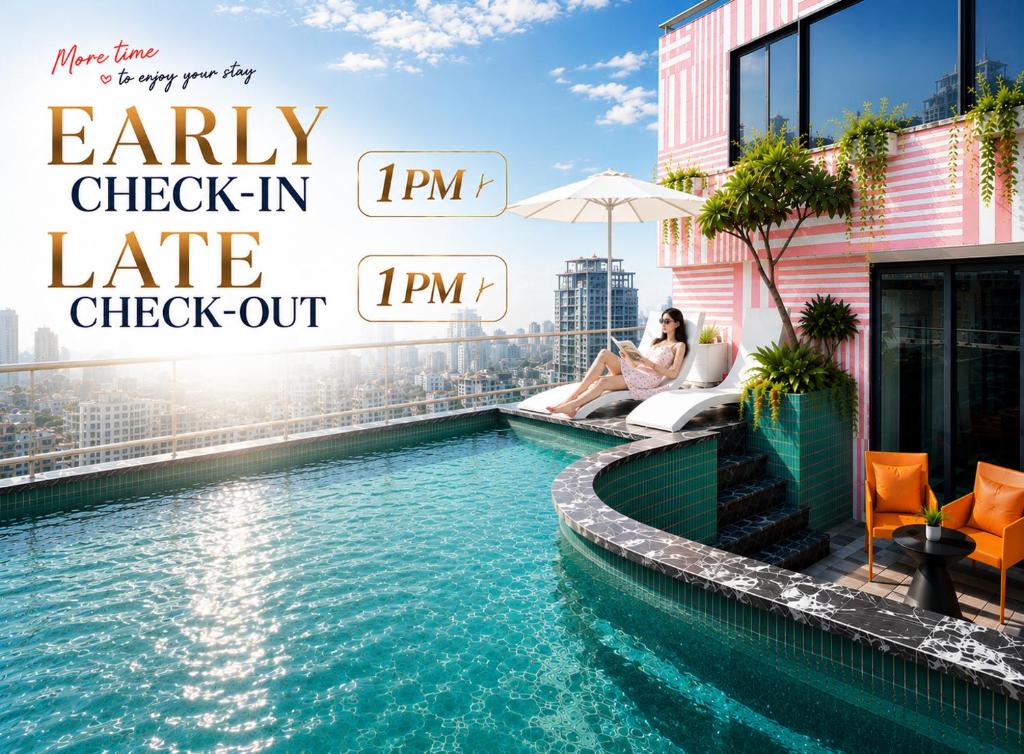 a woman sitting on a chair next to a swimming pool at Minasi Grand Hotel in Hanoi