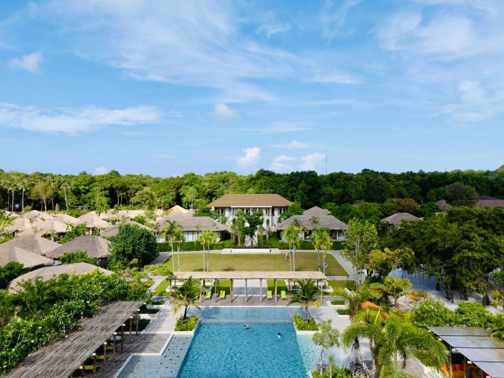 an aerial view of a resort with a swimming pool at JATI Koh Russey in Sihanoukville