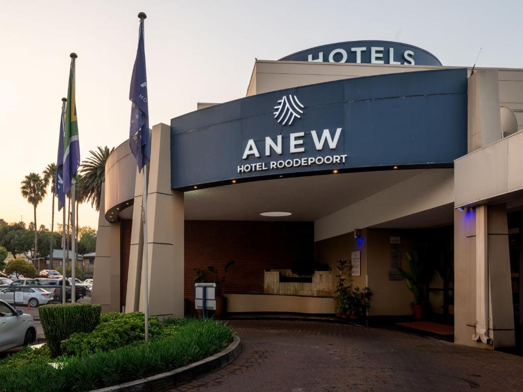 a view of the entrance to a hotel room at ANEW Hotel Roodepoort Johannesburg in Roodepoort
