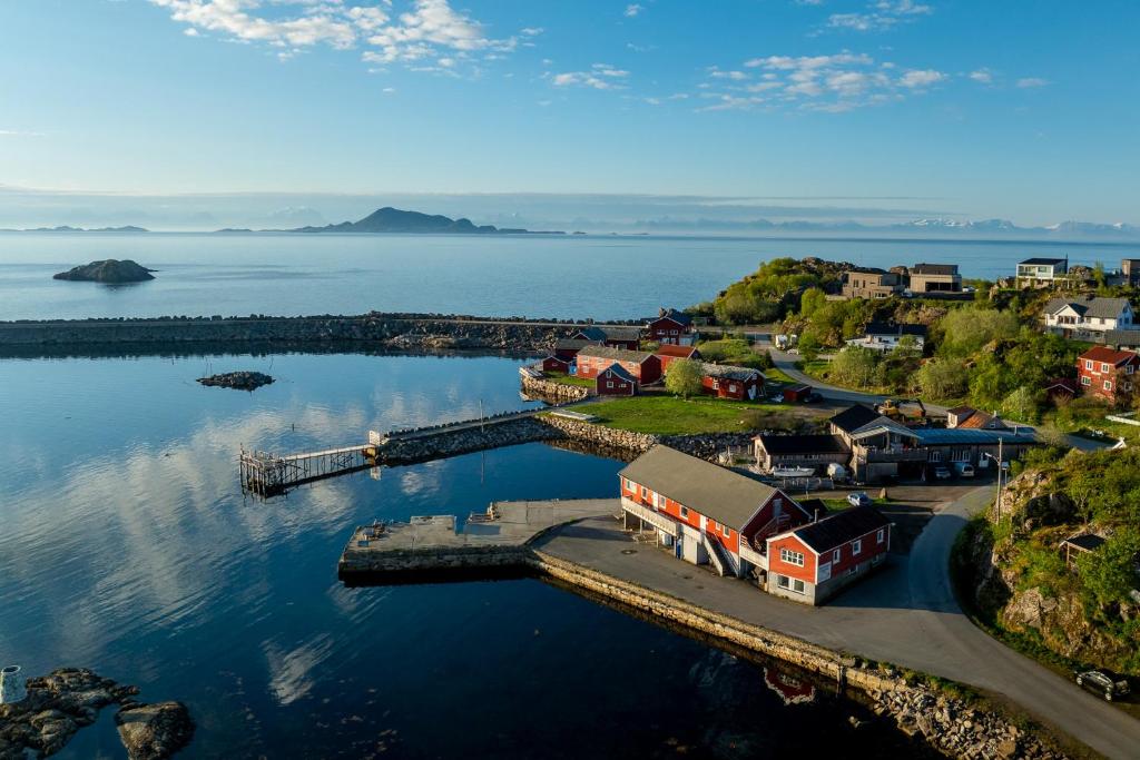 an aerial view of a small town on the water at Astra Whale - Waterfront Boutique Hostel in Lofoten in Kabelvåg