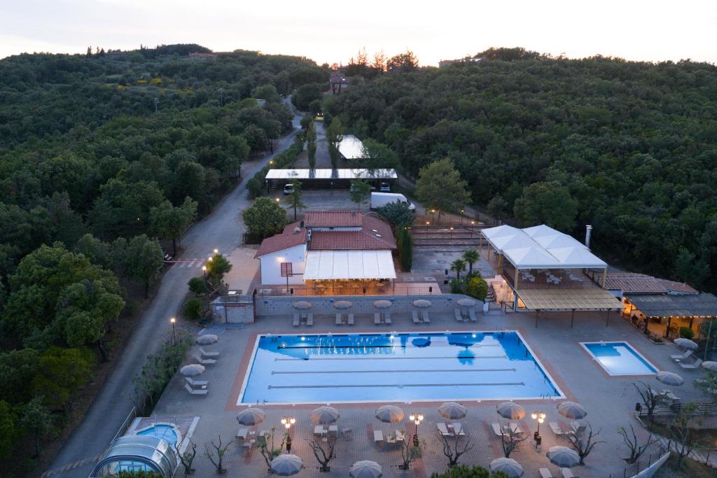 an aerial view of a resort with a swimming pool at Etrusco Camping Village in Casiano