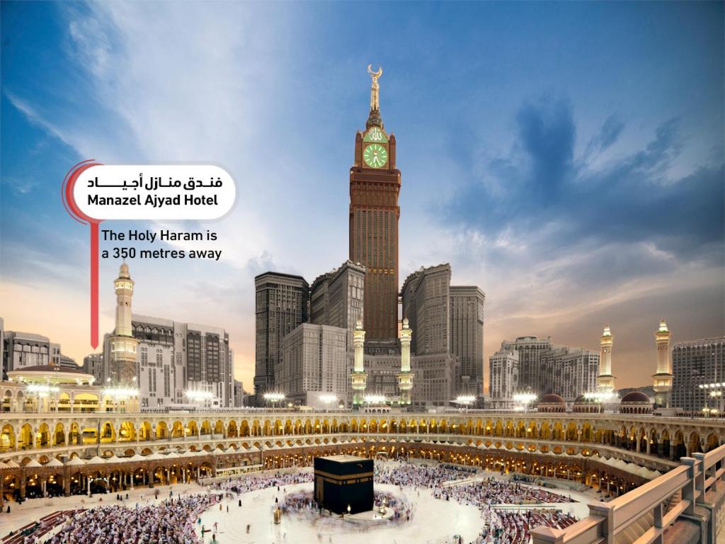 a view of a large city with a clock tower at Manazel Ajyad Hotel - previously Elaf Ajyad in Mecca