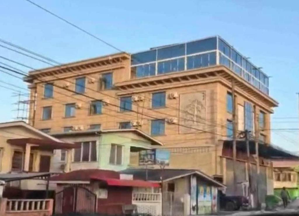 a tall building with a lot of windows at #1 Diamond Hotel and Residences in Georgetown