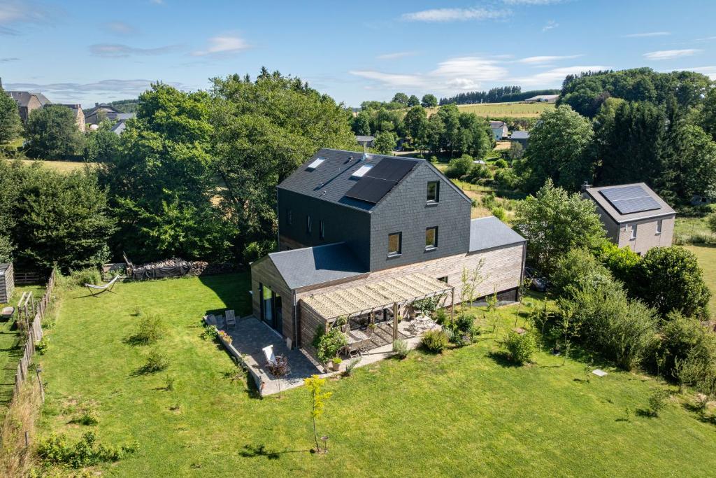 an aerial view of a house on a field at L'Oasis d'Yza in Gedinne