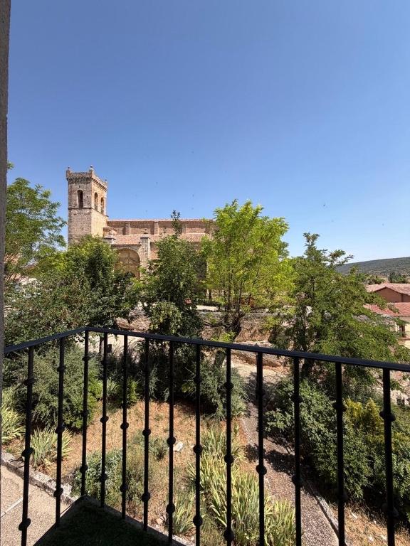 a view of a castle from a balcony at Casa Nectarius in Cifuentes