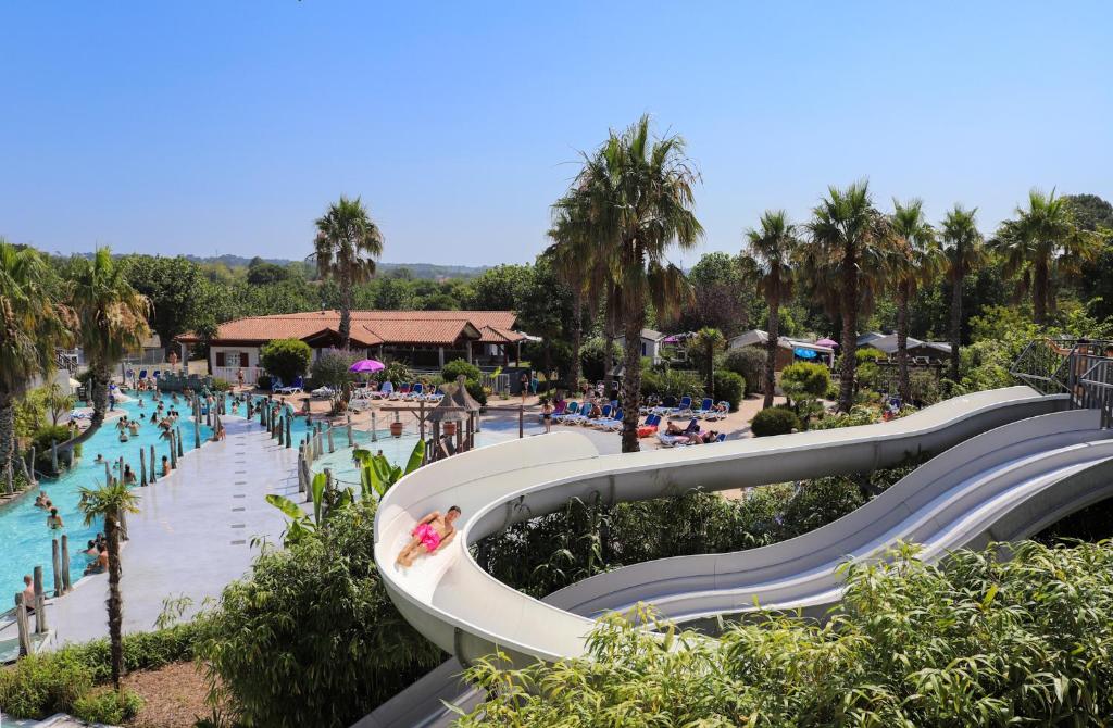 a view of a pool at a resort at Camping Pays Basque in Bidart