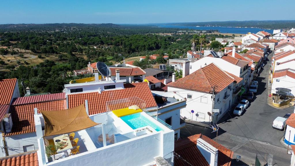 a view from the roof of a house with a swimming pool at DamnView Montargil Alentejo in Montargil
