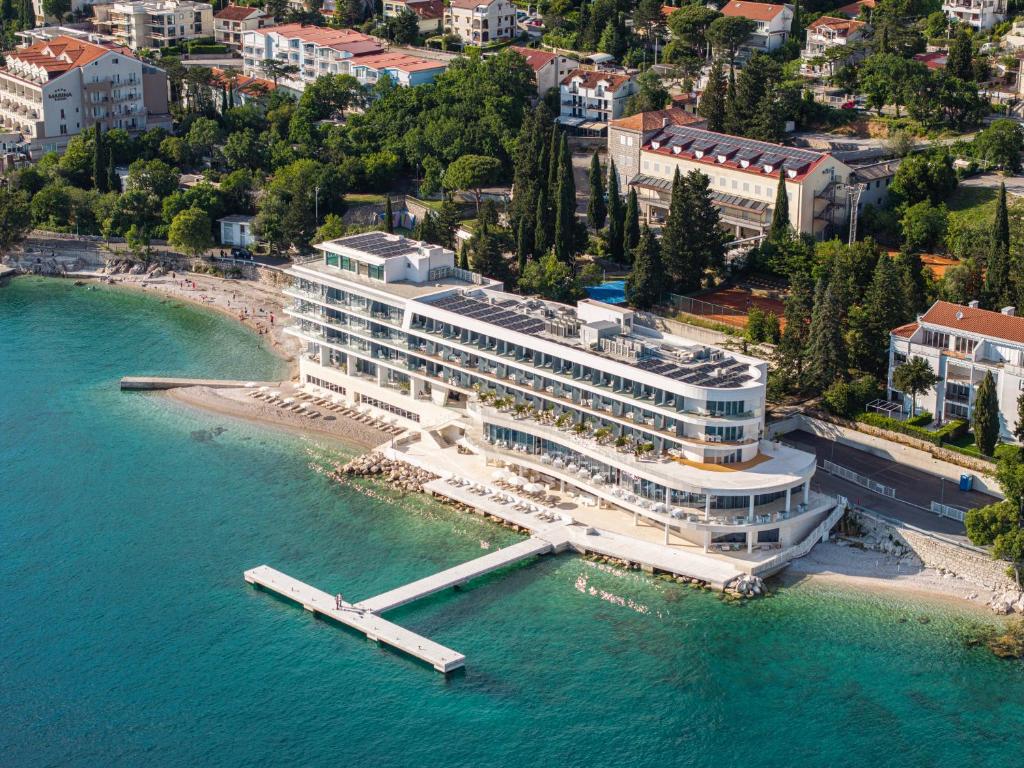 an aerial view of a large building on the water at Luxury Hotel Amabilis in Selce
