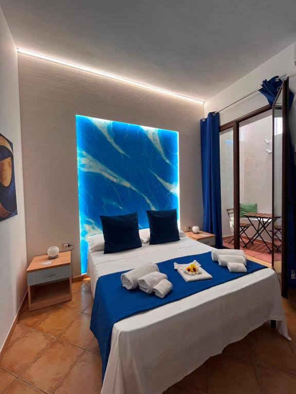 Ліжко або ліжка в номері "L'Oasi di Favignana" Room and Charme