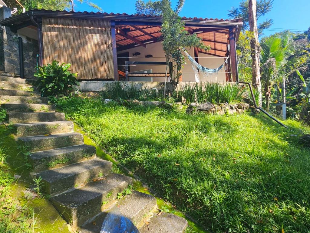 a set of stairs leading to a house at Green Area House in Abraão