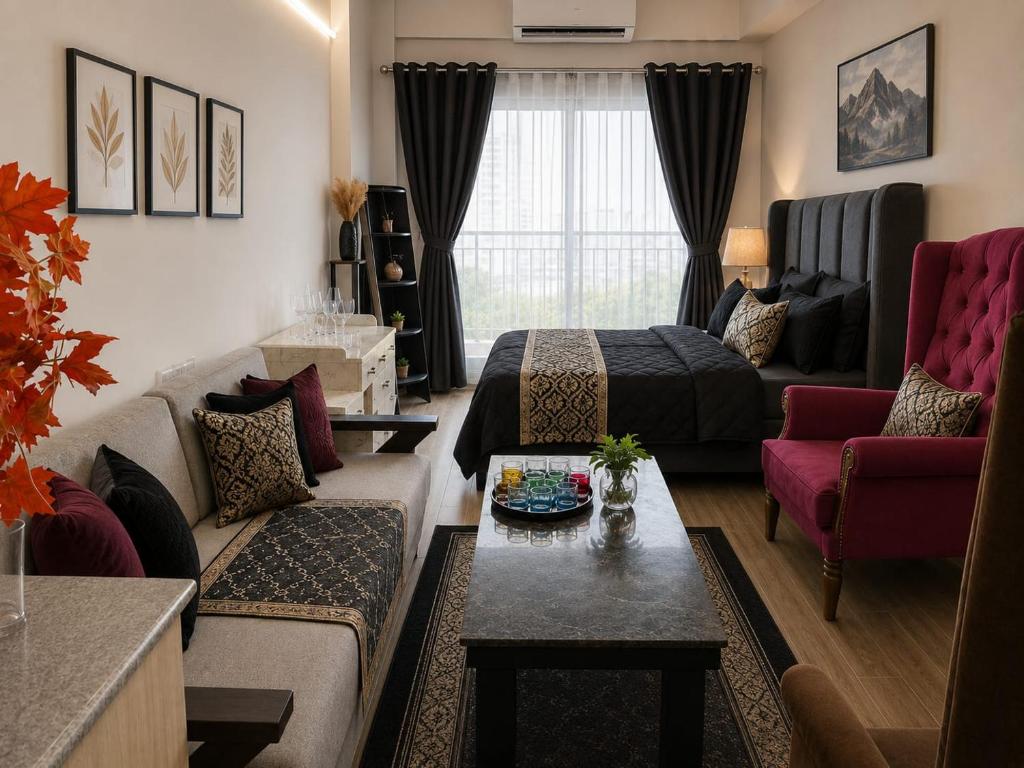 a living room with a couch and a bed at Dimond Villa in Greater Noida
