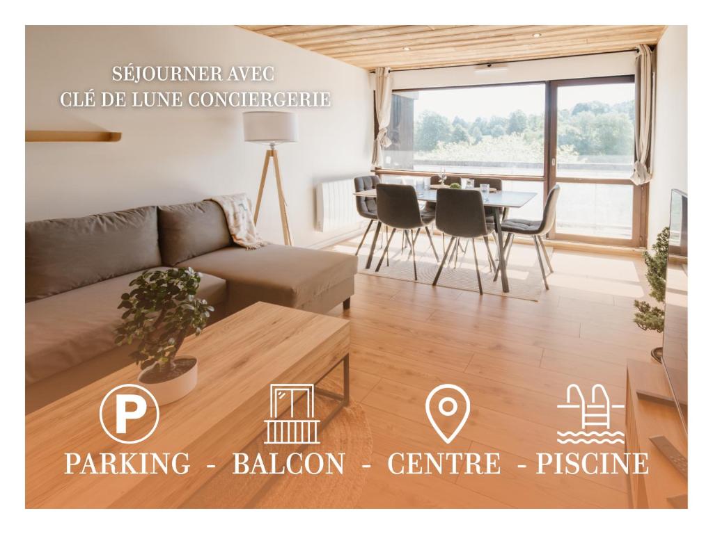a living room with a couch and a table at Le Nid Cozy - Appart avec Piscine, Terrain de Tenis et Balcon in Métabief