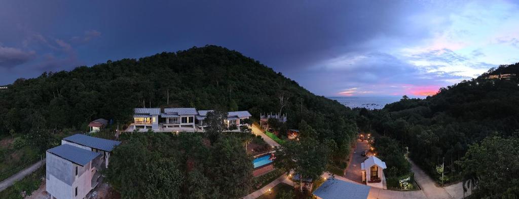 an aerial view of a house on a mountain at Greenery Hill in Ban Nok