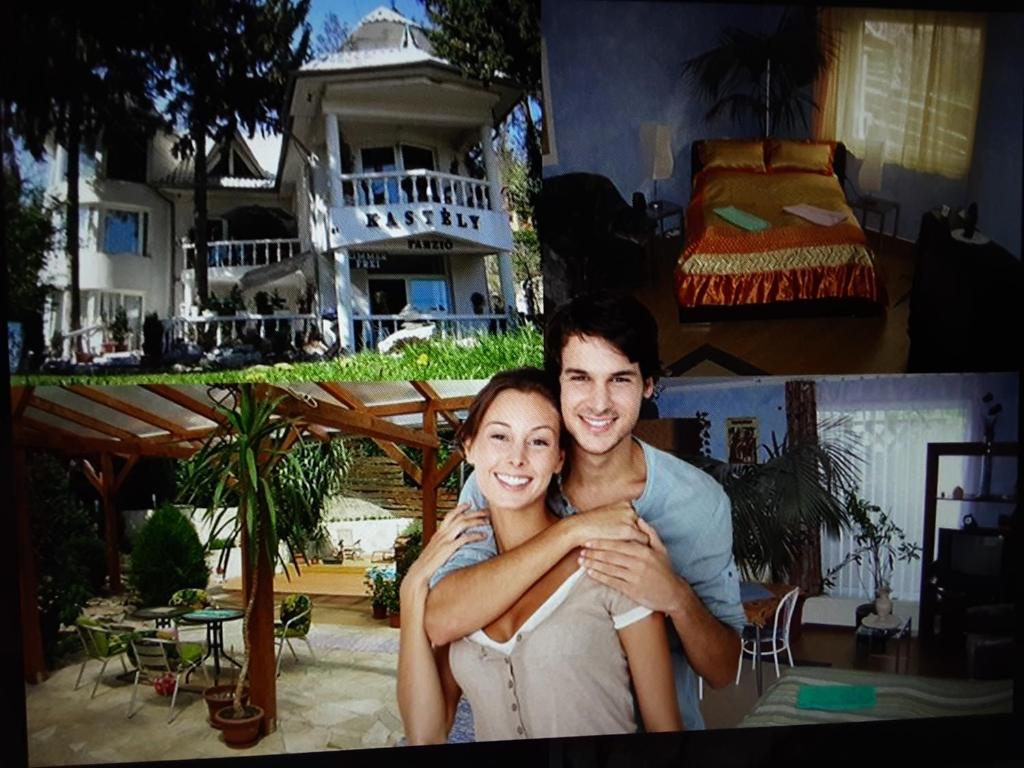 a man and a woman posing for a picture in front of a house at KASTELY ViLLA MISKOLCTAPOLCA in Miskolc