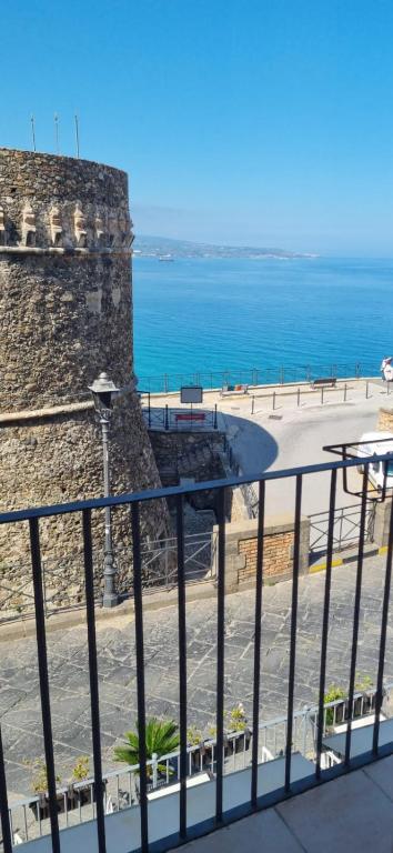 a view of the ocean from a balcony at Murat Guesthouse in Pizzo