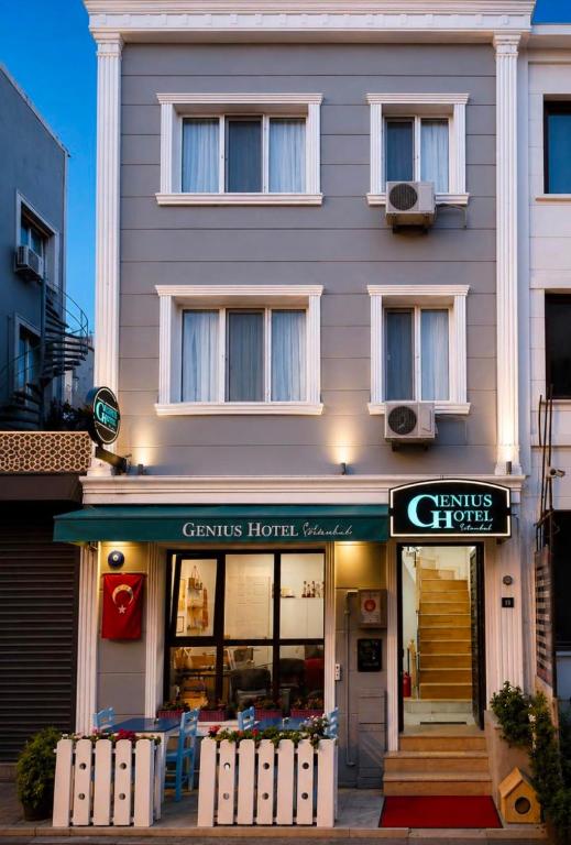 a store front of a building with a sign in front at Genius Hotel Istanbul in Istanbul