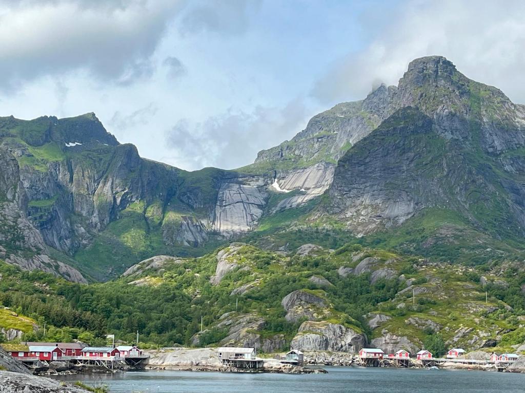 a view of a mountain with a body of water at Rorbu in Nusfjord, Lofoten in Nussfjord