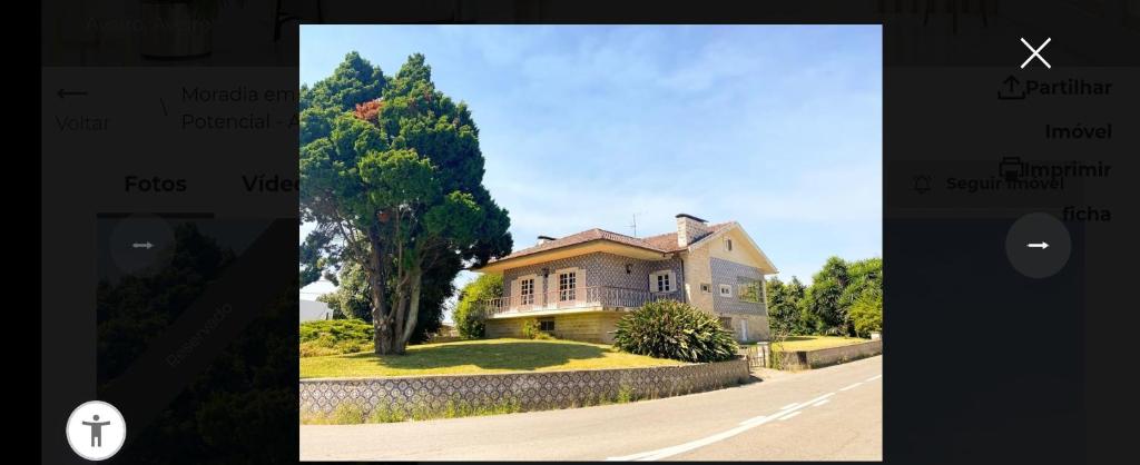 a picture of a house on the side of a road at Oliveirinha, Aveiro, Portugal in Oliveirinha