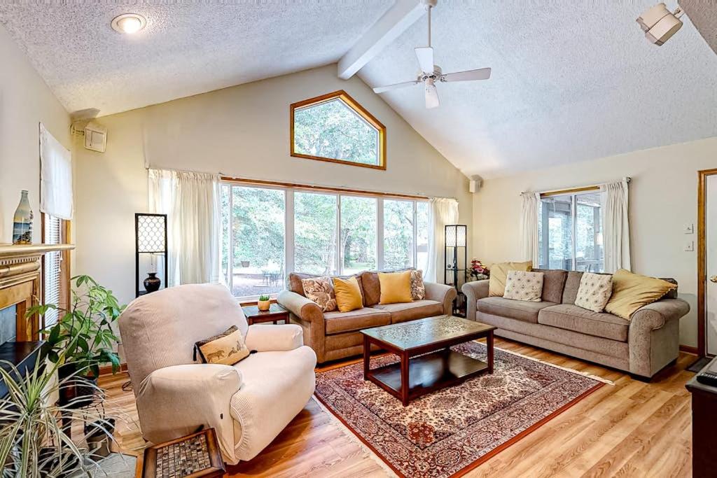 a living room with a couch and a table at Ocean Pines Fairway in Ocean Pines