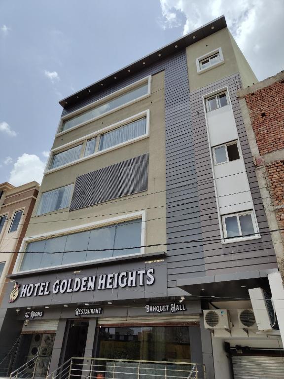 a building with a sign that reads hotel golden heights at Hotel Golden Heights in Ajmer