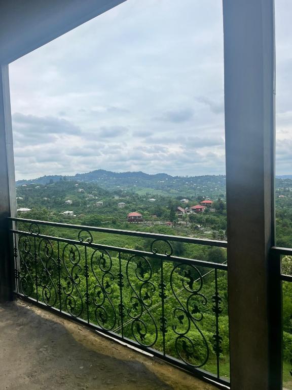 a balcony with a view of the mountains at Kakuti village in Natskhavatevi