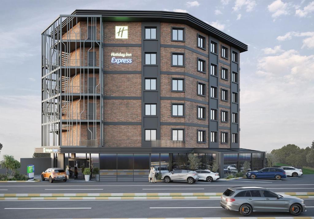 a rendering of a building with cars parked in a parking lot at Holiday Inn Express Yalova by IHG in Yalova