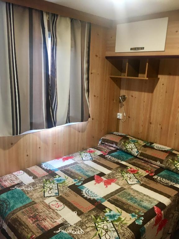 Postel nebo postele na pokoji v ubytování Camping Boneta