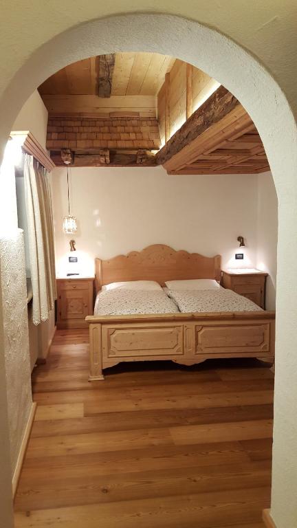 Postel nebo postele na pokoji v ubytování Historic Hotel Ristorante La Stua
