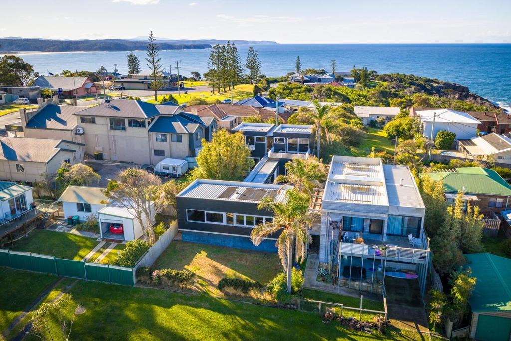 an aerial view of a house in a suburb at East Lane in Tathra
