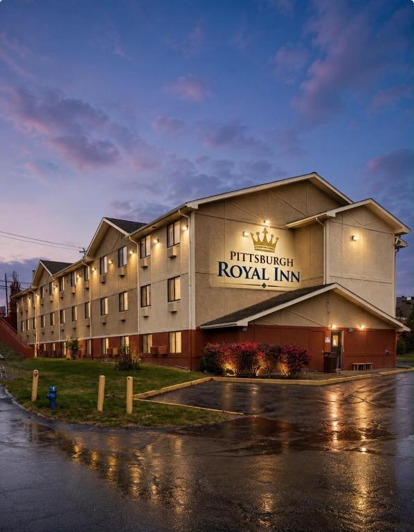 a rendering of the refurbished royal inn at night at Pittsburgh Royal Hotel in Moon Township