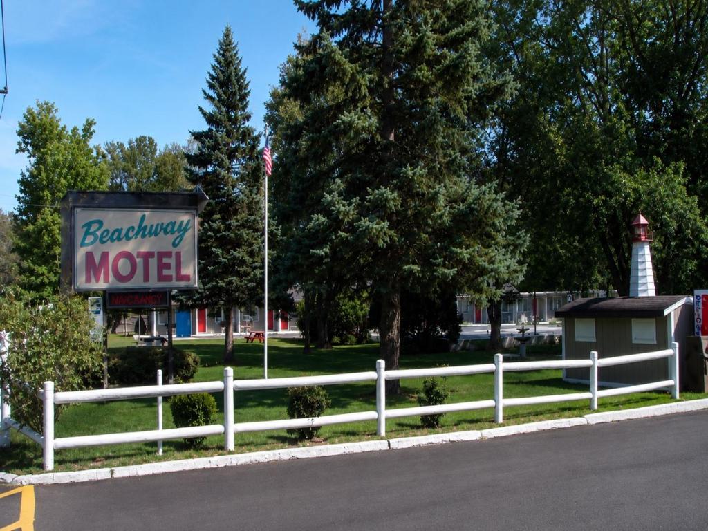 a sign for a motel on the side of a road at Beachway Motel in Salisbury
